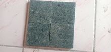 Green stone for pool tiles