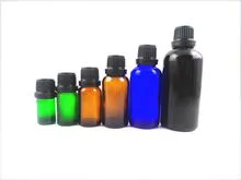 amber essential oil bottle with  plastic cap and stopper