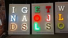 Illuminated characters/logos