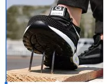 Venta al por mayor de zapatos de seguridad de alta calidad cabeza de acero suela de acero anti-aplastamiento anti-perforación