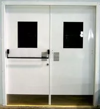 double door with fire rating , with wire glass as vision panel