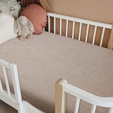 Protetor de colchão de berço com elástico