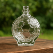 Botella de cristal con forma de fútbol