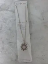 Colar de girassol dourado em aço inoxidável