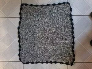 RECTANGULAR RUG IN BLACK CROCHET