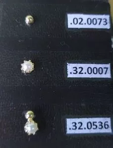 Trio of pearl earrings clad in gold 18k