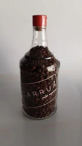 Café Carruá en granos - botella de 250grs