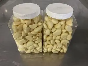 ajo pelado (enlatado)